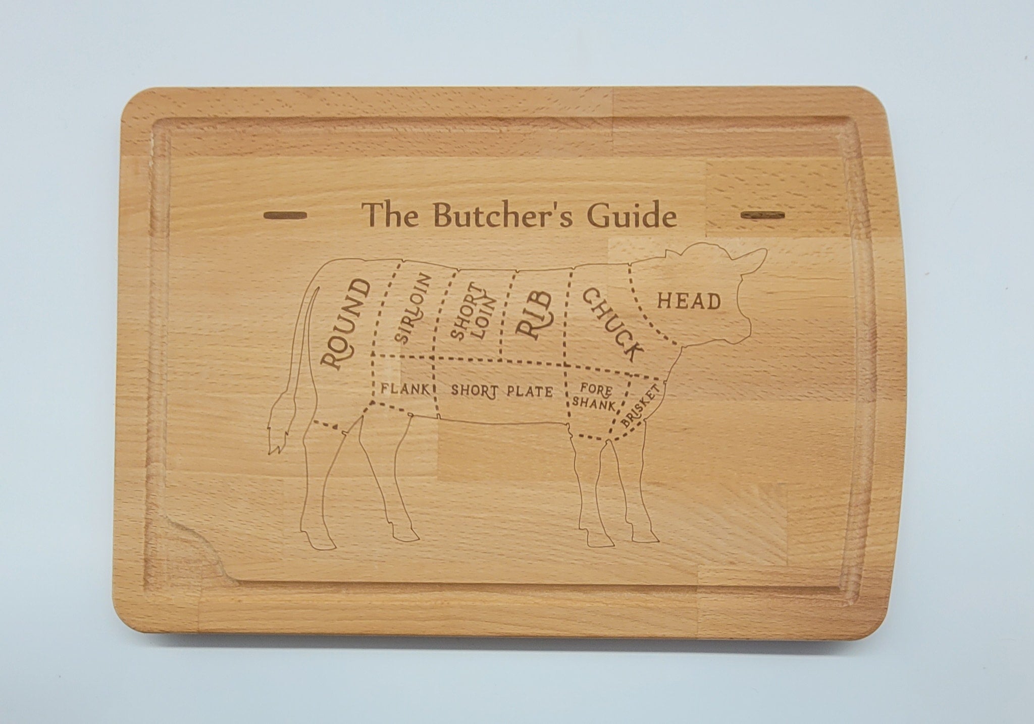 Cutting boards with juice grooves