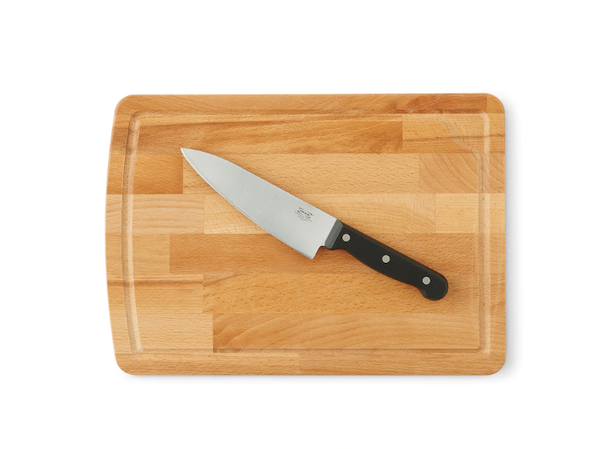Cutting boards with juice grooves